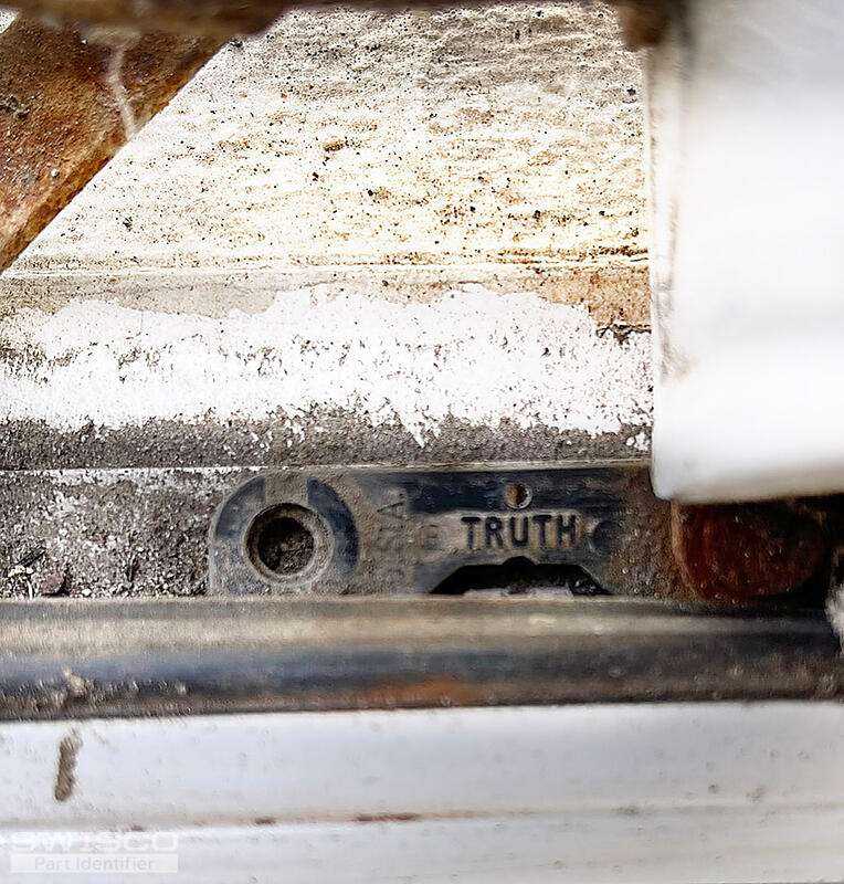 markings on lower hinge mechanism3012