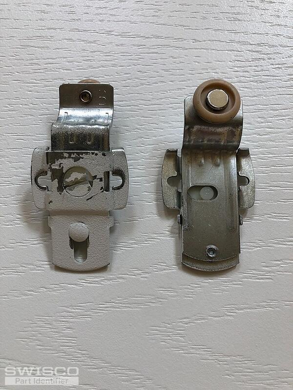Sliding door rollers - front and back of hardware.