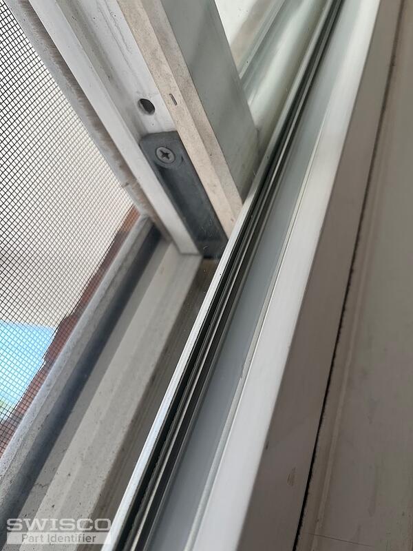 Window sash pivot bar