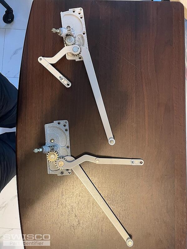 Caement window operator arms