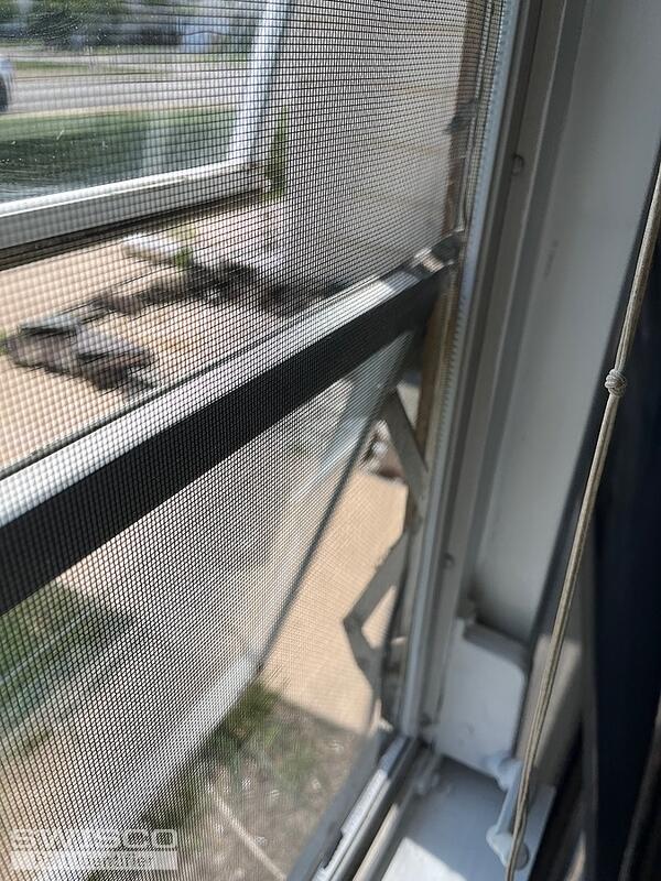 Crank handle and coil for an OLD jalousie window