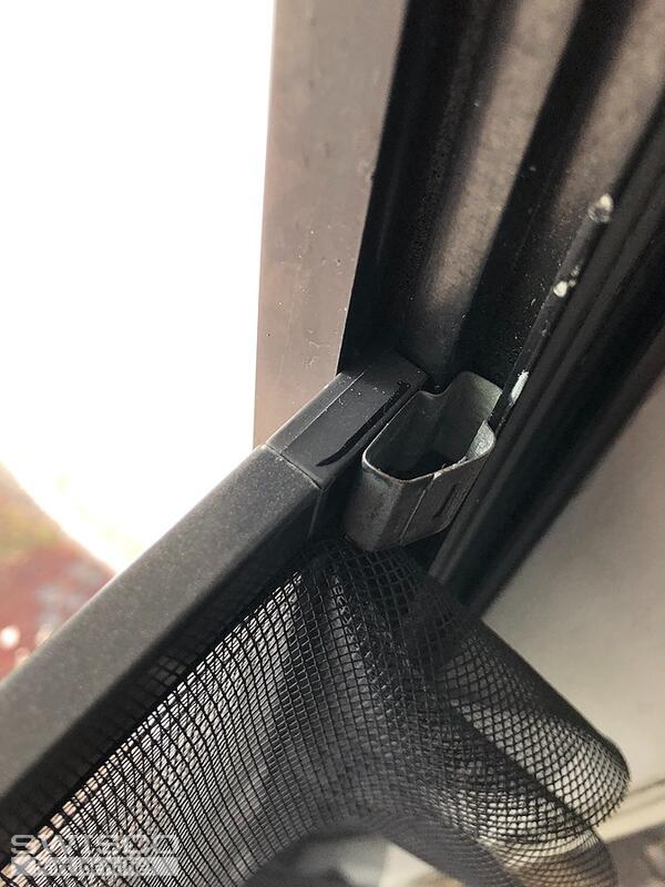 storm-door-window-using-the-retainer-clip