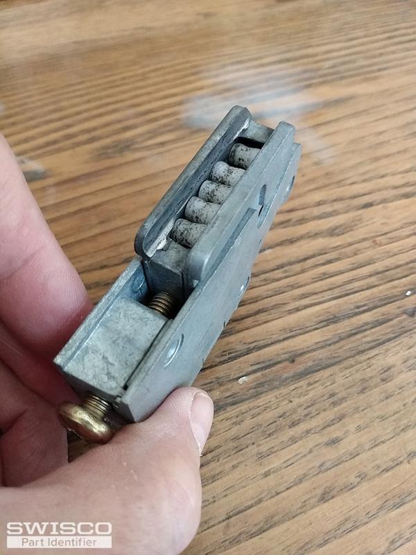 Photo of sliding glass door roller