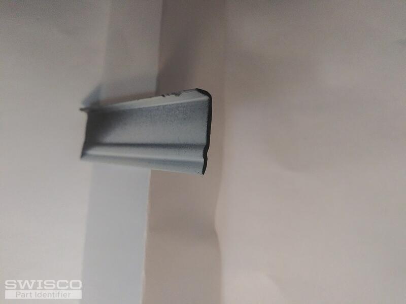 Horizontal. Side abutting the glass