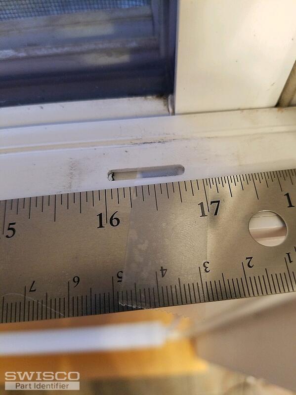 vertical window tilt latch empty