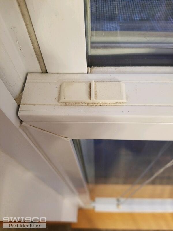 vertical window tilt latch