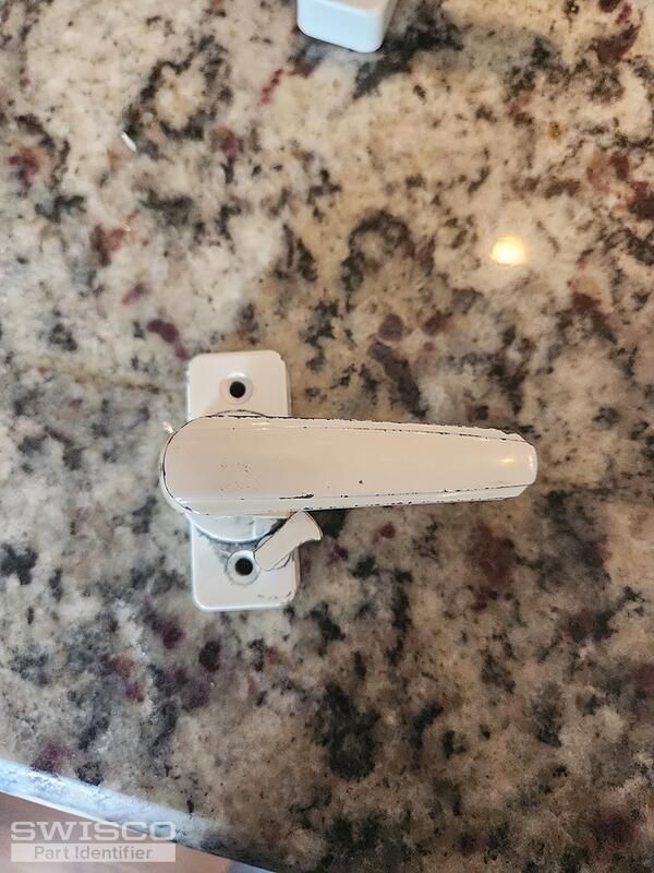 Storm door locking handle