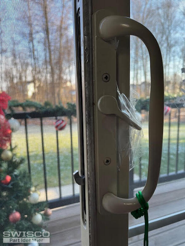 patio door mechanism bottom locking tab