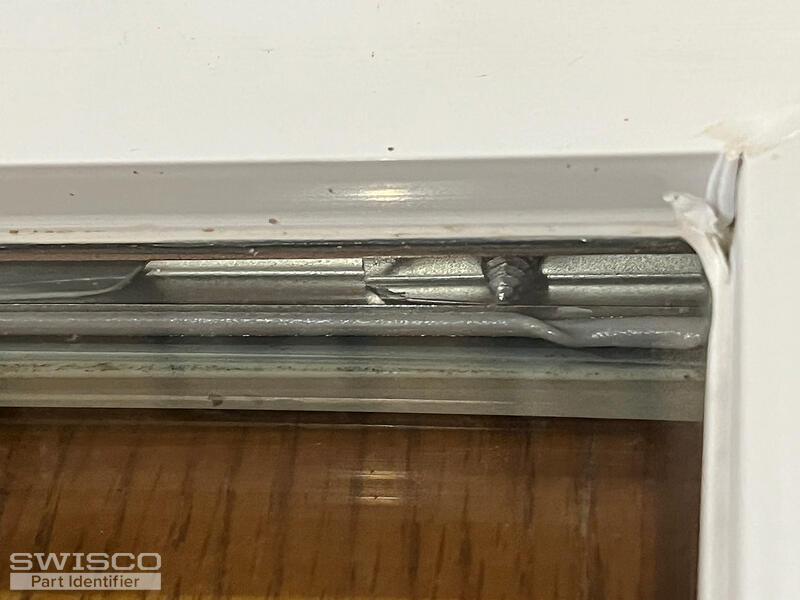Sash bottom screw inside window frame view