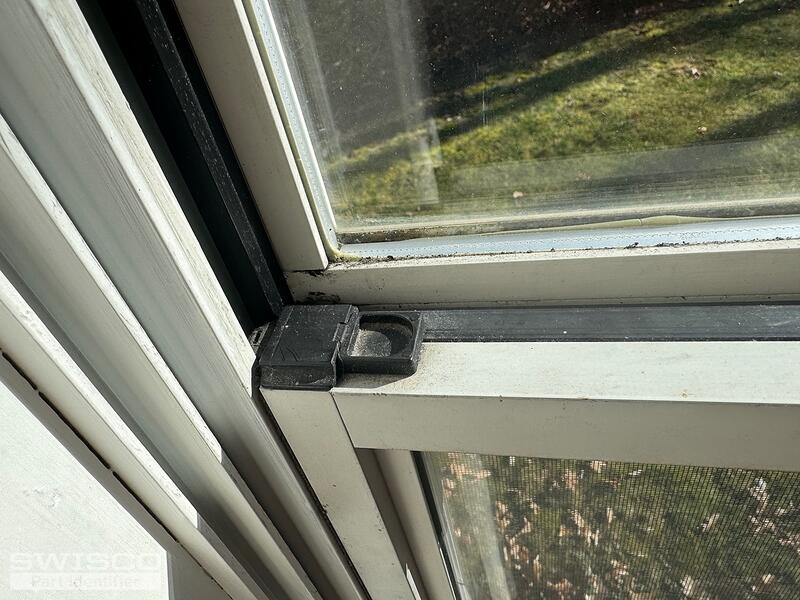 Norandex tilt latch