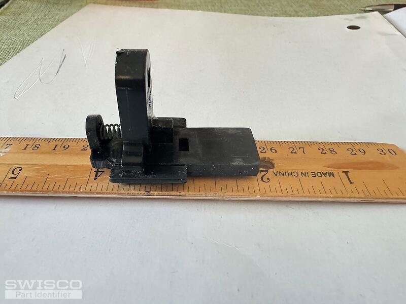 Norandex tilt latch