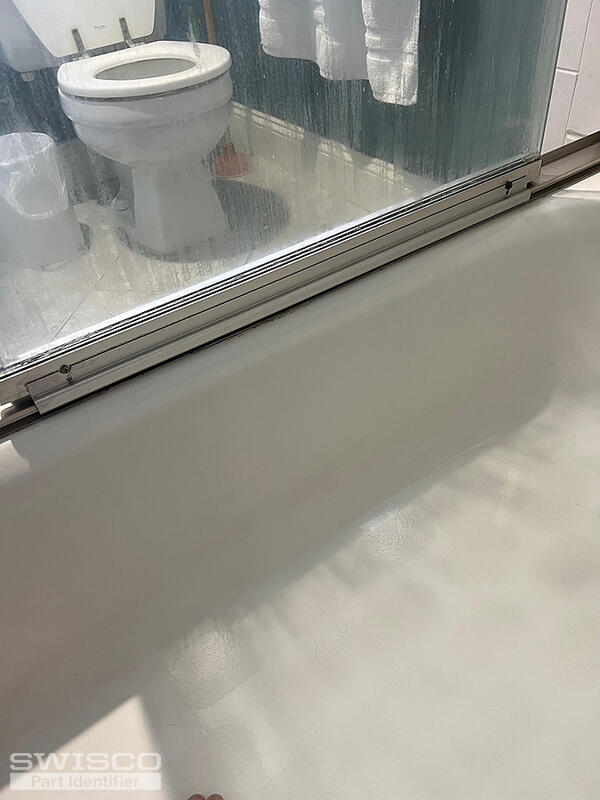 installed shower door rail