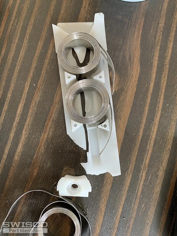 broken coil spring housing