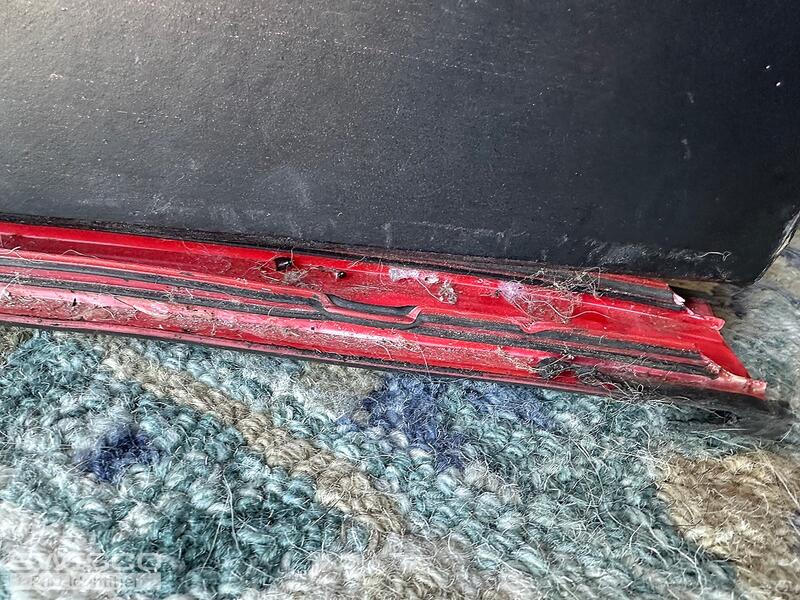 Iron door sweep
