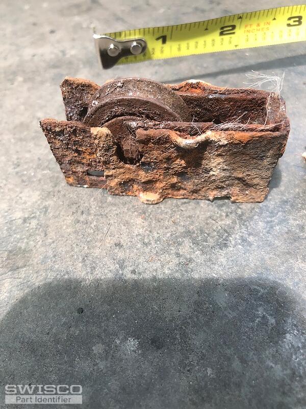 rusted roller assembly