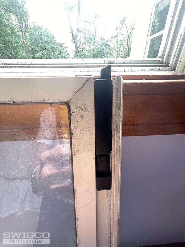 Storm window latch