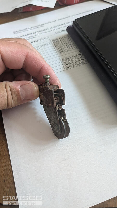 Metal door roller