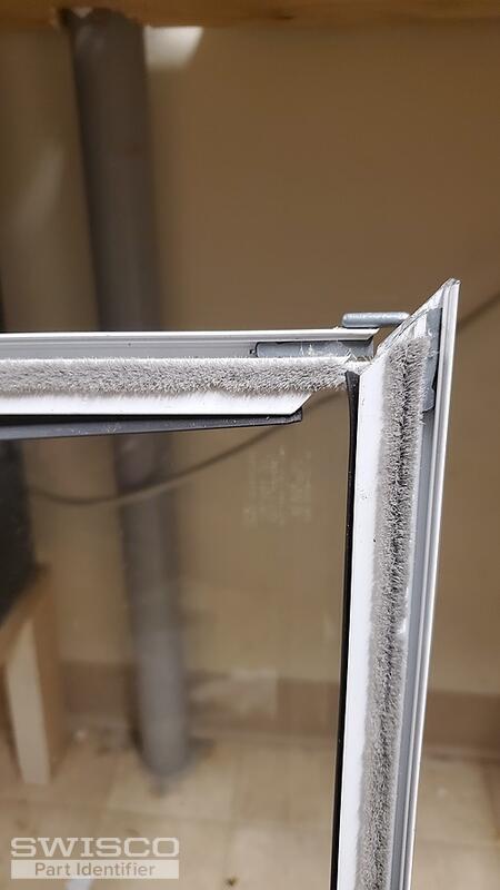 Storm window corner bracket