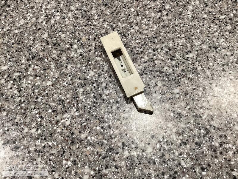 Window tilt latch