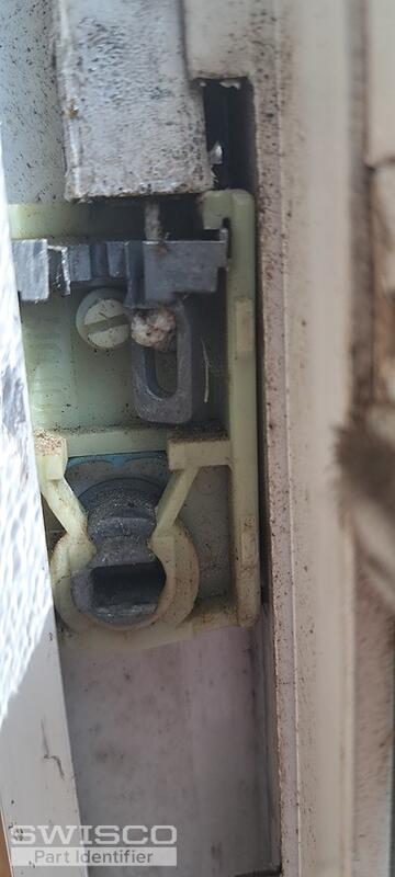 Old aluminum window balance shoe