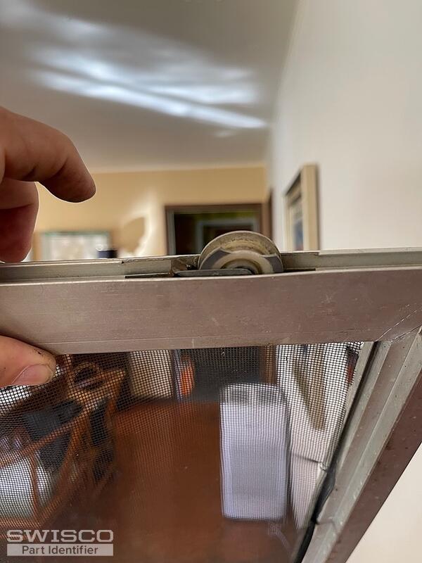 Patio door screen slider roller assembly