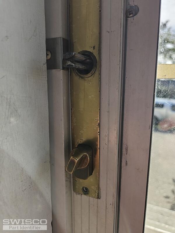 Storm door dead bolt