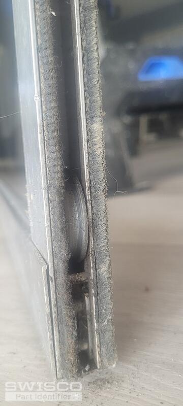 Sliding door roller assembly