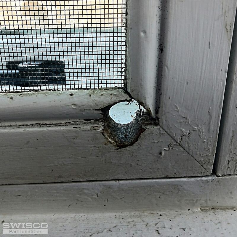Window crank hole