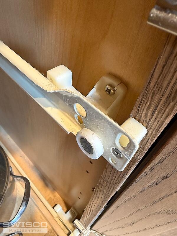 Glides for cabinet roll-out shelf