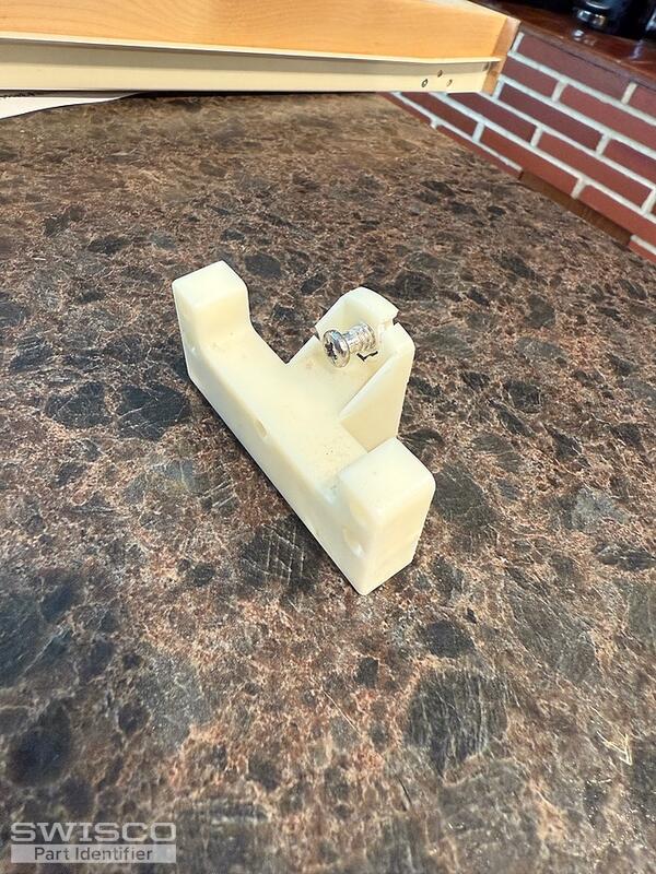 Glides for cabinet roll-out shelf