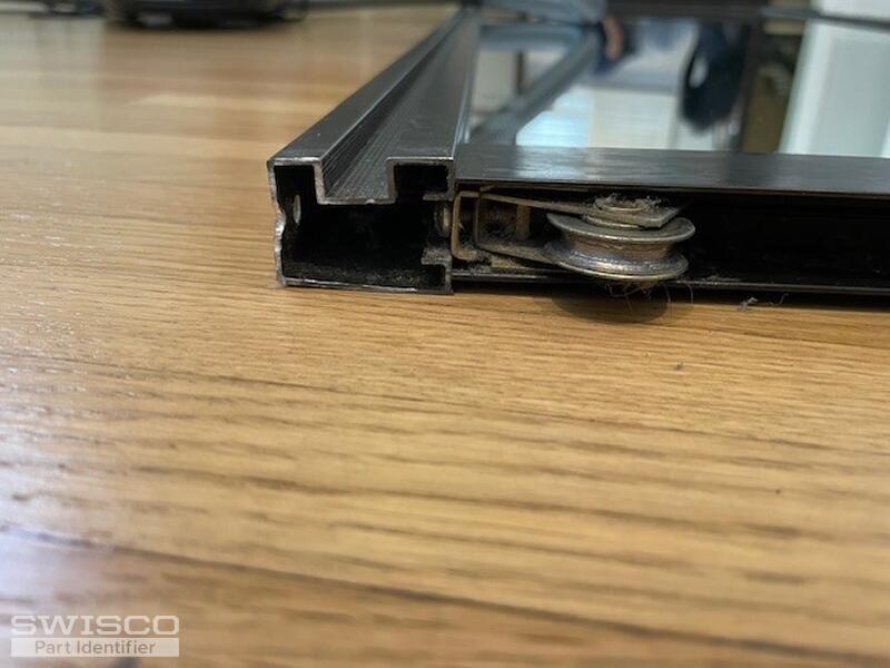 Roller_assembly_in_door_frame