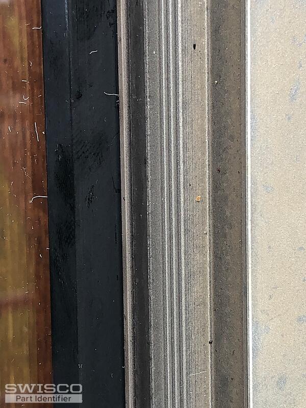 Storm window retainer