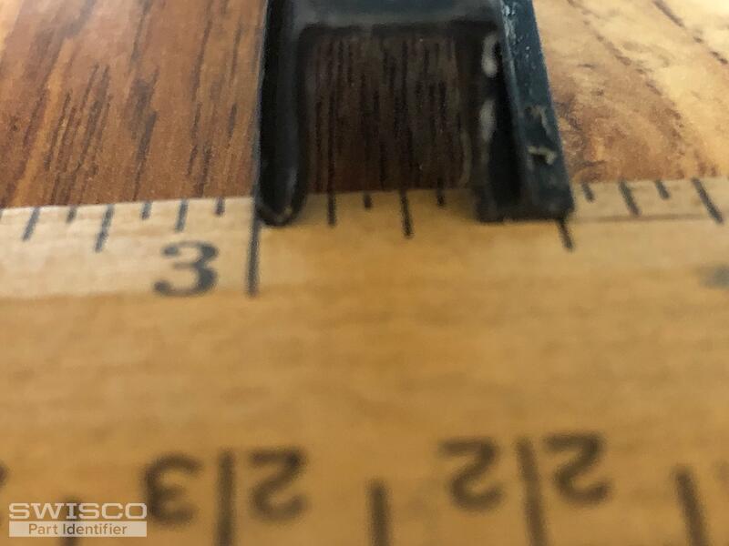 Storm window retainer