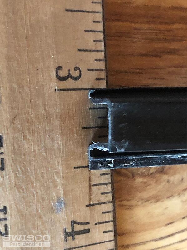 Storm window retainer