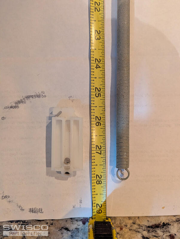 Tension spring length and slide