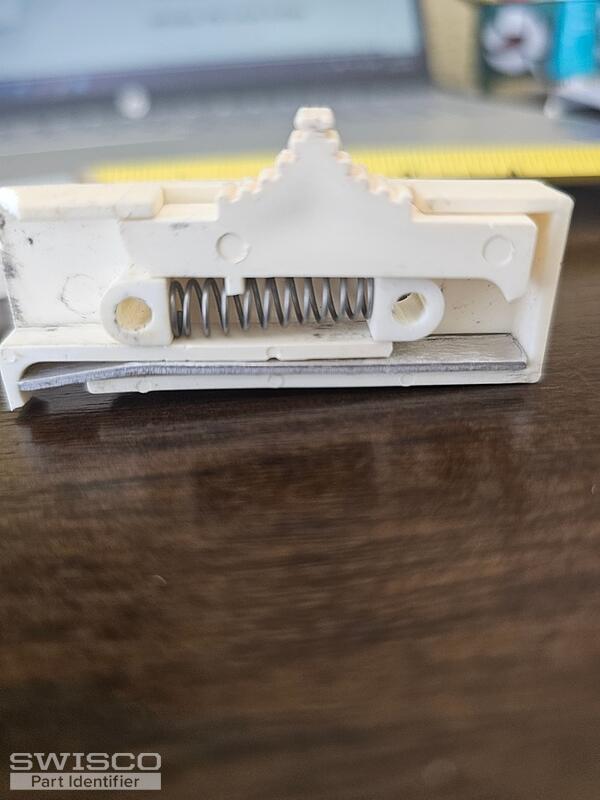 window tilt latch bottom