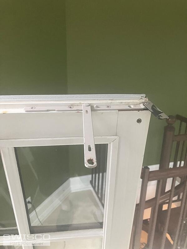 Window hinge top of window 4